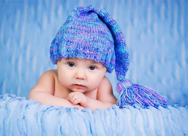 При якій температурі одягати шапку дитині?